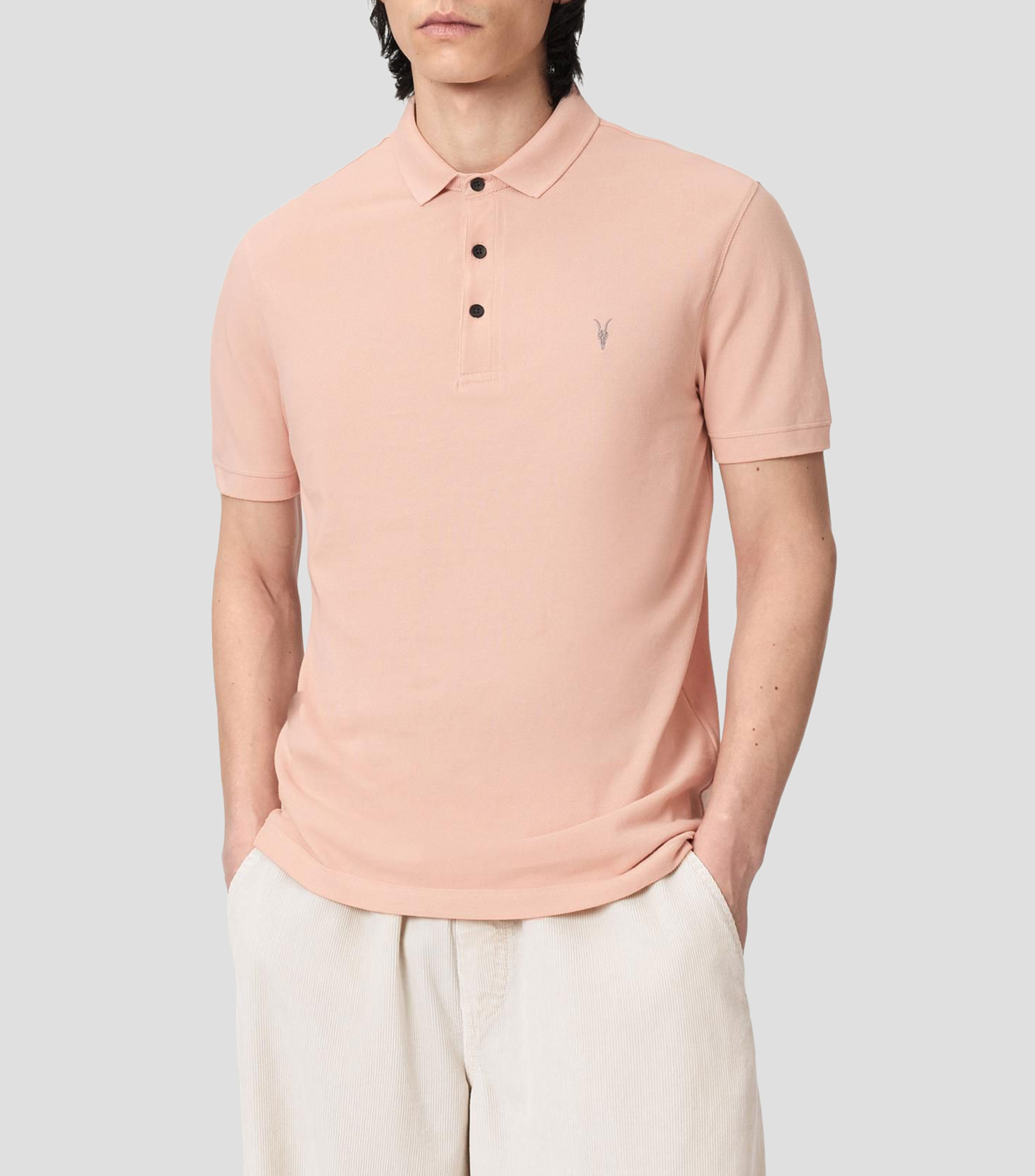 Playera tipo polo con manga corta lisa Hombre